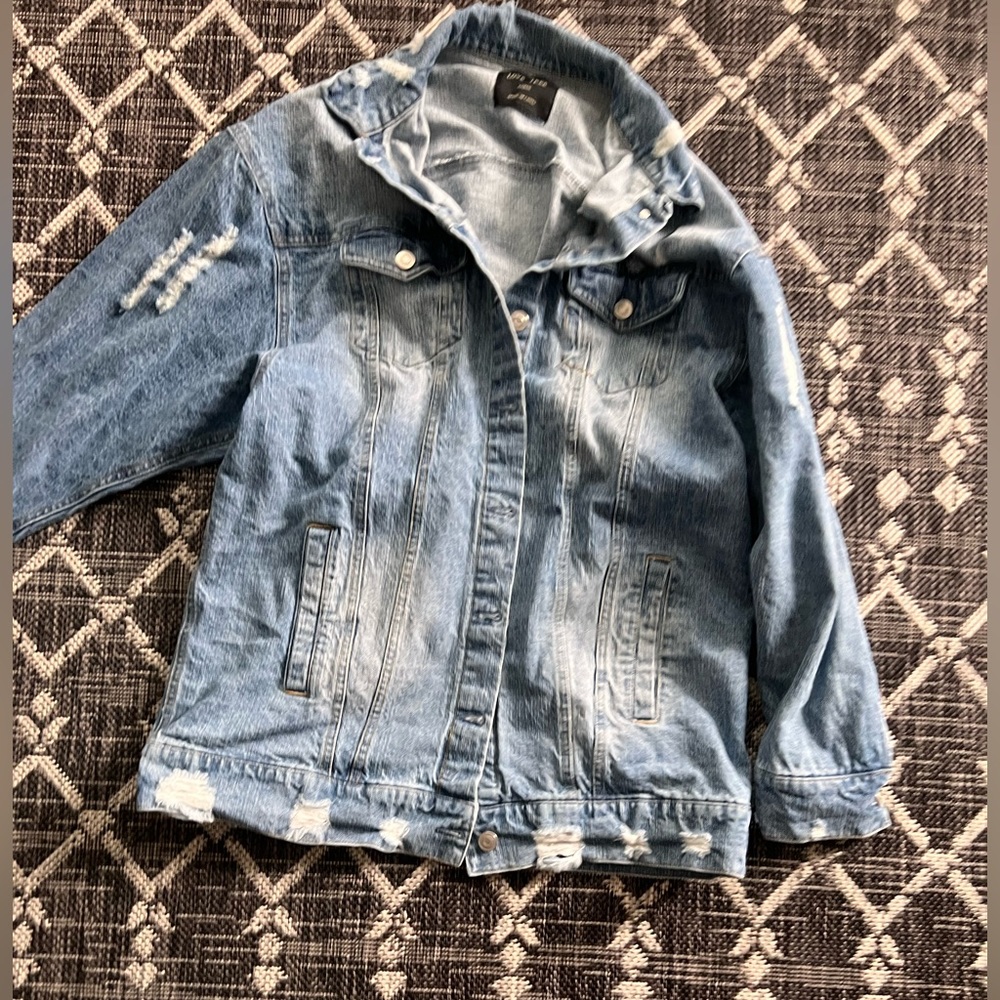 Distressed jean jacket